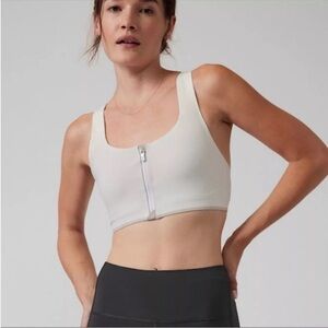 New-Athleta-XXS-white-empower ll train bra-A-C, zipper front, adj. sports bra.